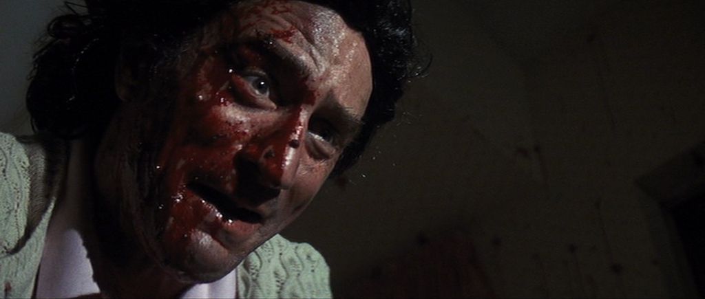 Robert De Niro in Cape Fear con il sangue sul viso