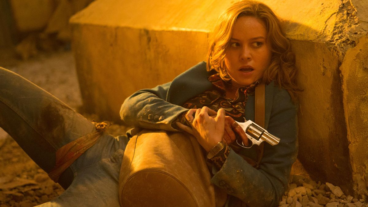 Brie Larson tiene la sua pistola dietro un mattone di roccia Free Fuoco