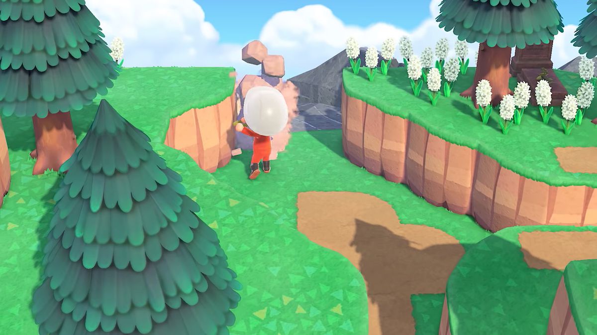 Un abitante del villaggio spacca le rocce con una pala in uno screenshot di Animal Crossing: New Horizons.