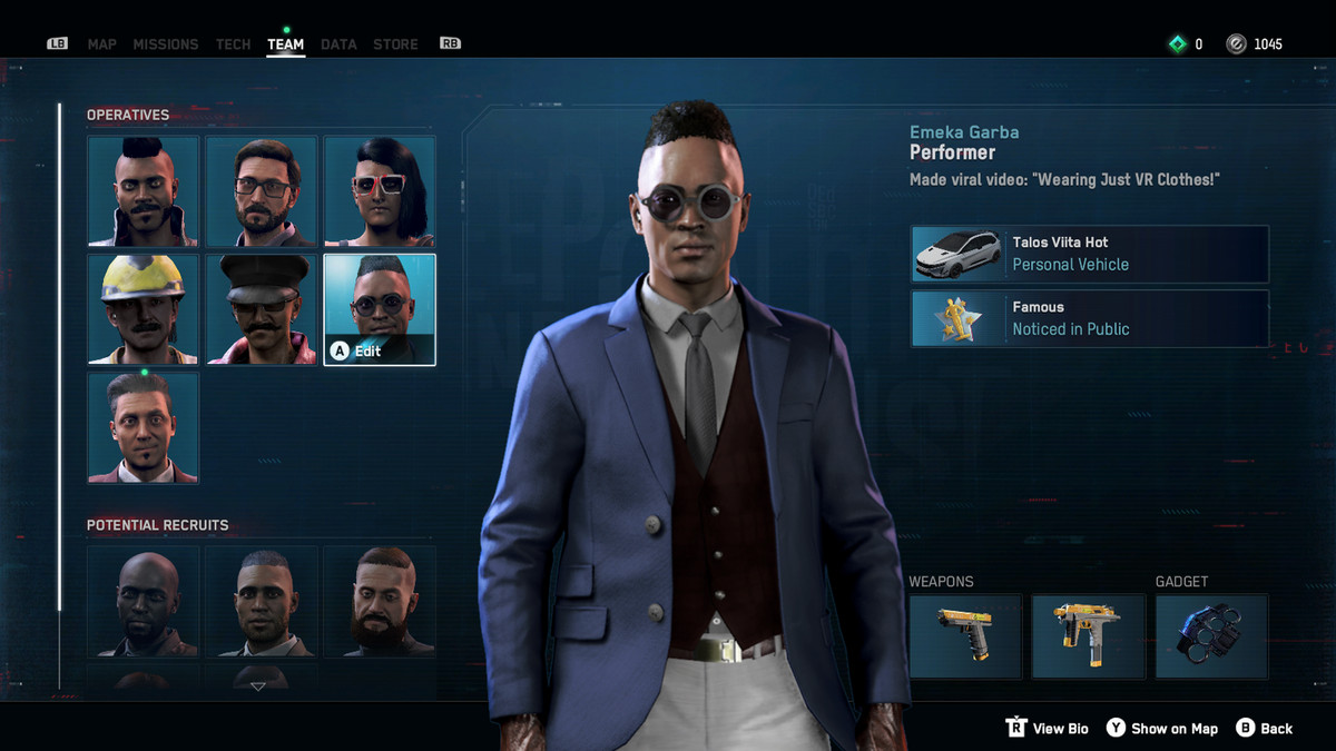 Screenshot della schermata della squadra in Watch Dogs Legion che mostra un agente di nome Emeka Garba, che indossa un blazer blu e un giubbotto blu scuro su pantaloni bianchi.