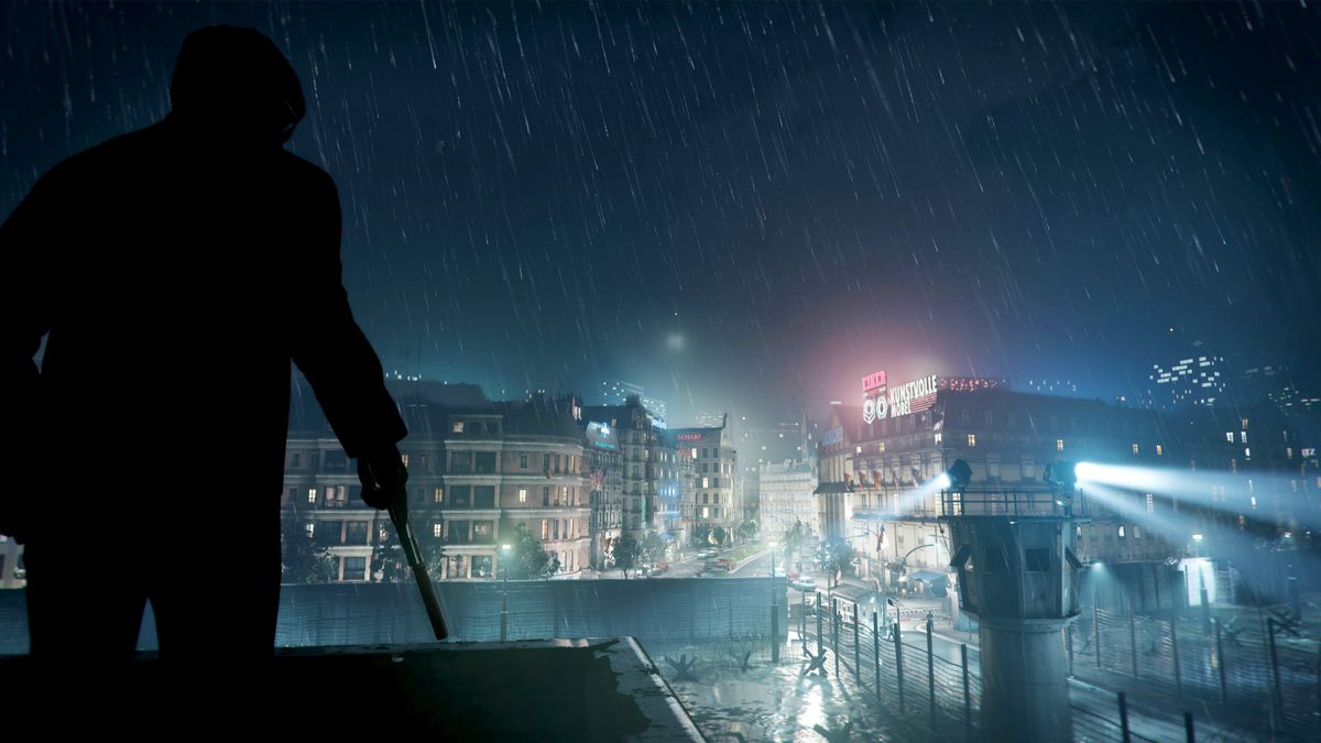 A silhouetted figure with a gun stands on a rooftop in the rain in Black Ops Cold War