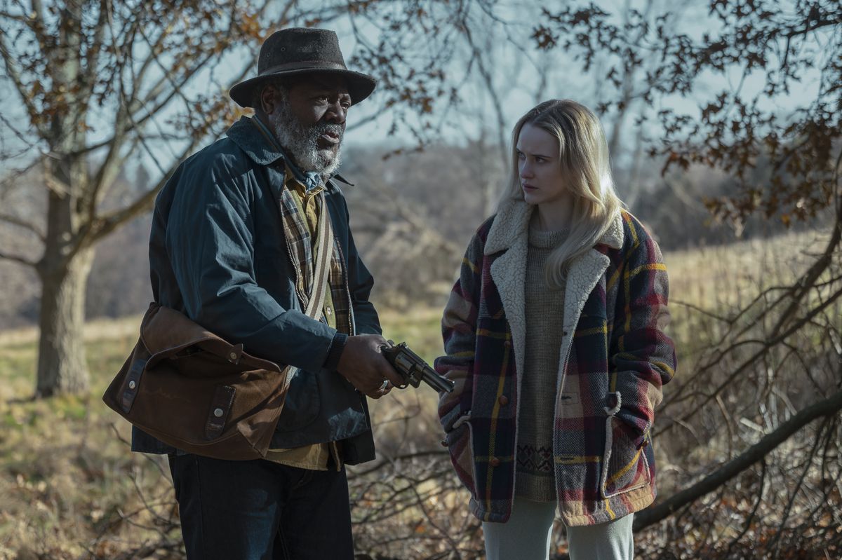 FRANKIE FAISON and RACHEL BROSNAHAN star in I’M YOUR WOMAN and hold a gun in a scene