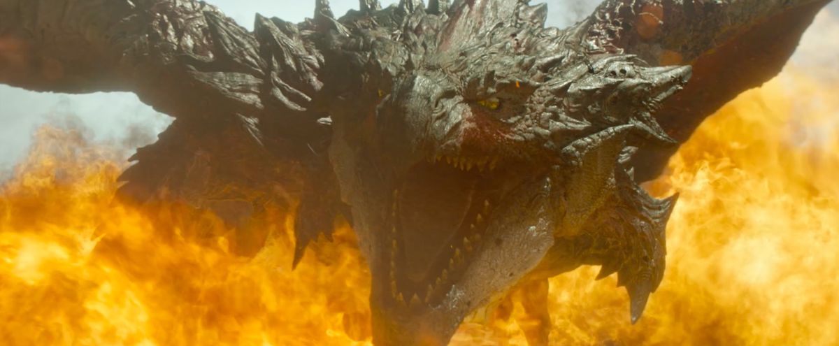 greater rathalos breathing fire in the monster hunter movie