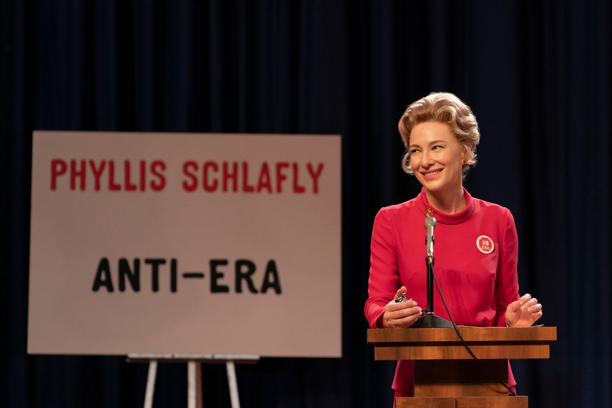 Cate Blanchett as Phyllis Schlafly standing in front of an Anti-Era sign in Mrs. America