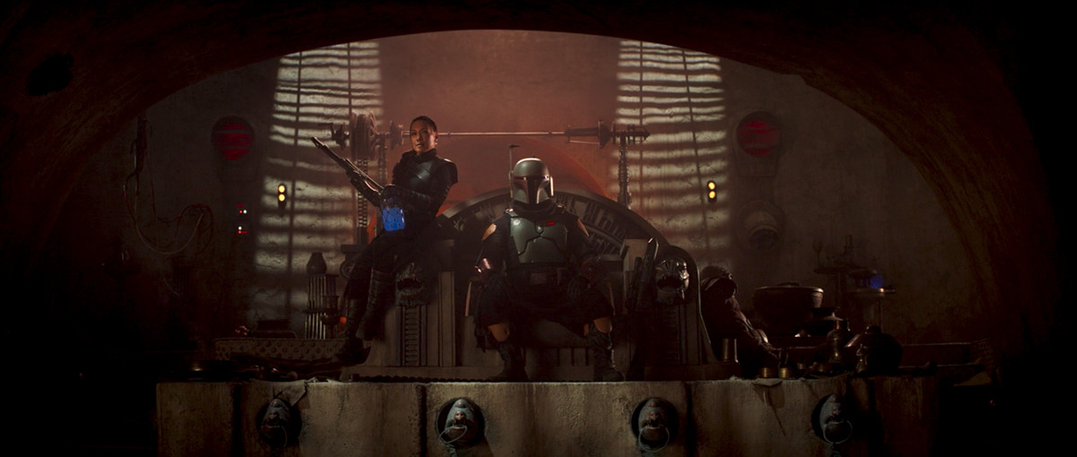 Boba Fett e Fennec Shand siedono sul trono del Palazzo di Jabba nella seconda stagione di The Mandalorian