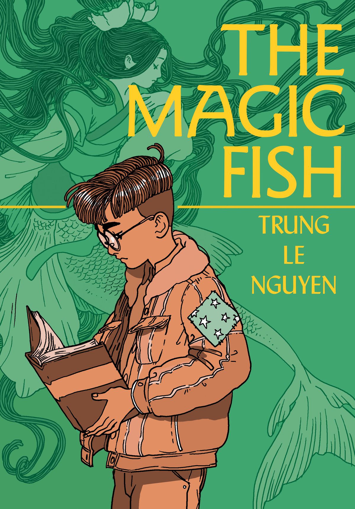 Tiến, a young Vietnamese-American boy, reads a book on the cover of The Magic Fish (2020).