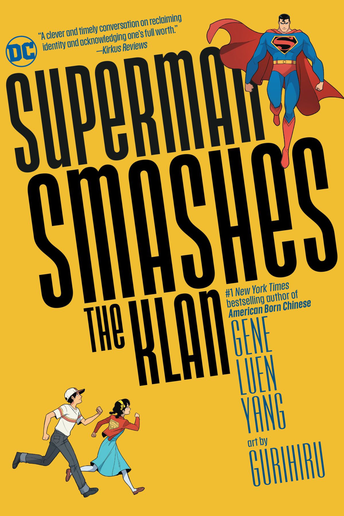 Superman and a couple of kids on the cover of Superman Smashes the Klan (2020).