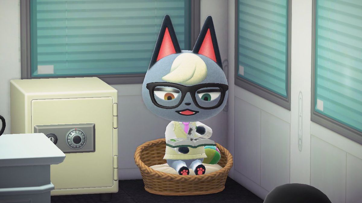 Raymond il gatto si siede su una cuccia in Animal Crossing mentre legge un libro.