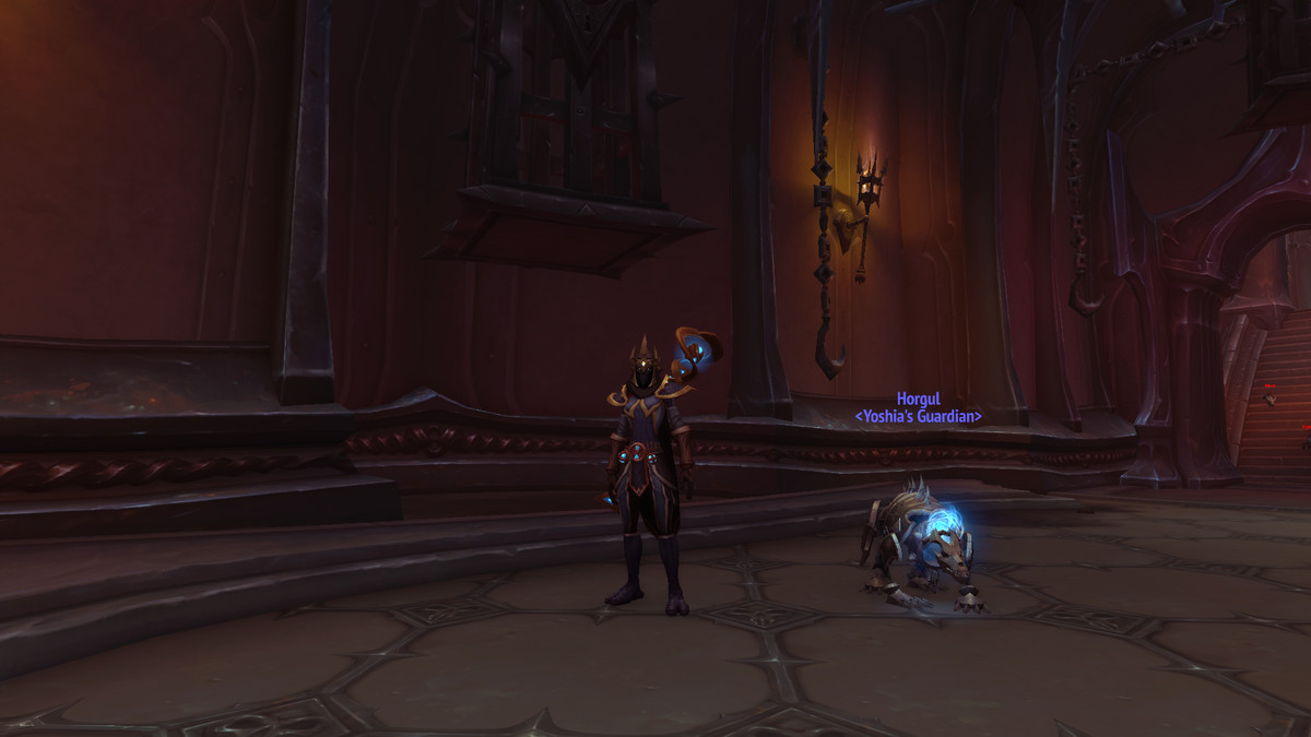 World of Warcraft: un giocatore si trova accanto a una bestia ossea non morta nelle sale di Torghast.