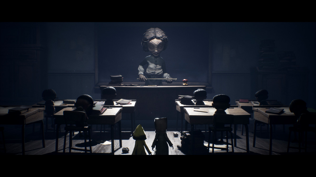 Mono e Six stanno di fronte al mostruoso insegnante di scuola in Little Nightmares 2