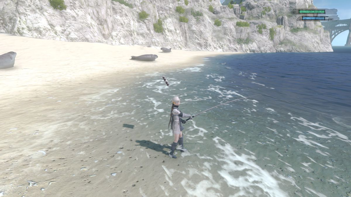 Nier va a pescare in un bellissimo oceano a Nier Replicant.