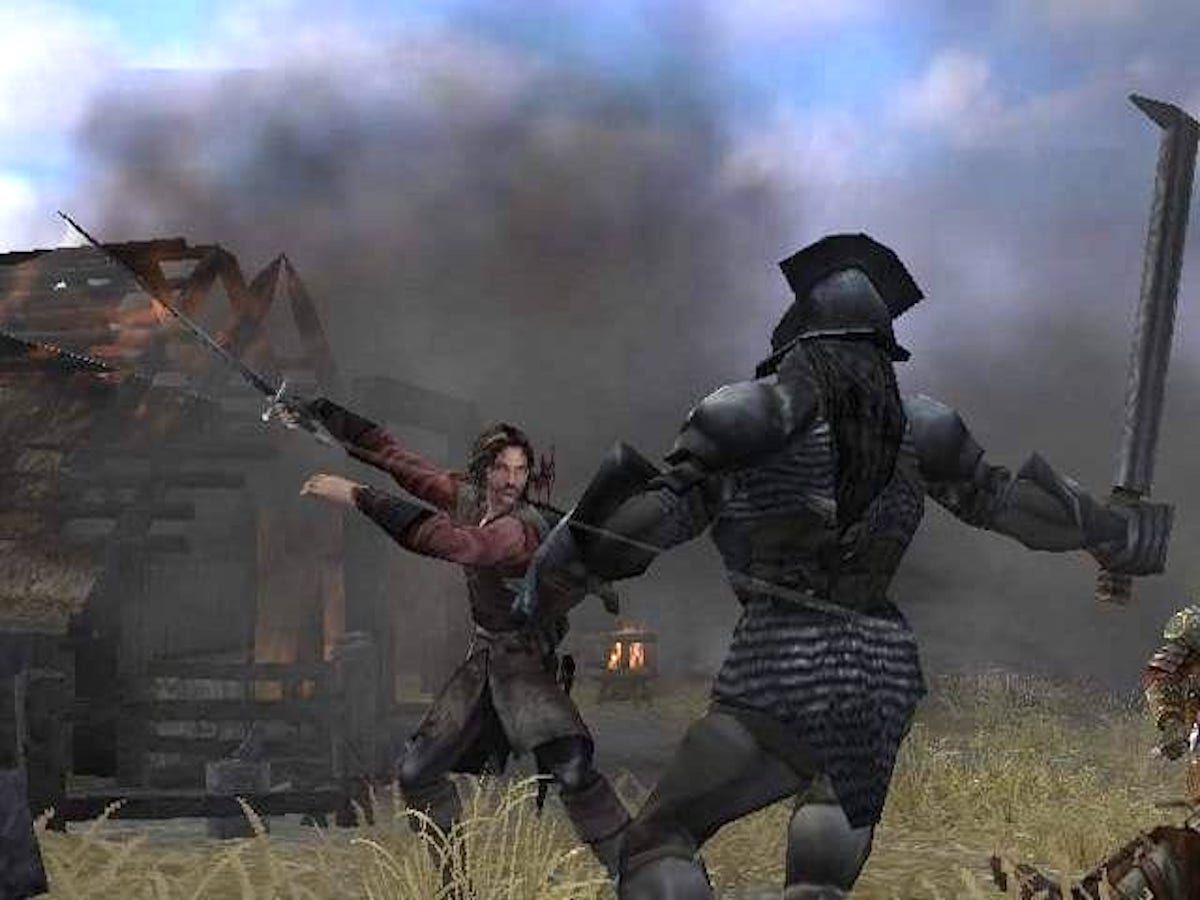 Aragorn colpisce un orco nel gioco Two Towers per PS2