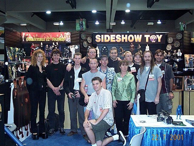 Richard Taylor and Ringer fans in front of the Sideshow Toys booth at San Diego Comic-Con 2001.