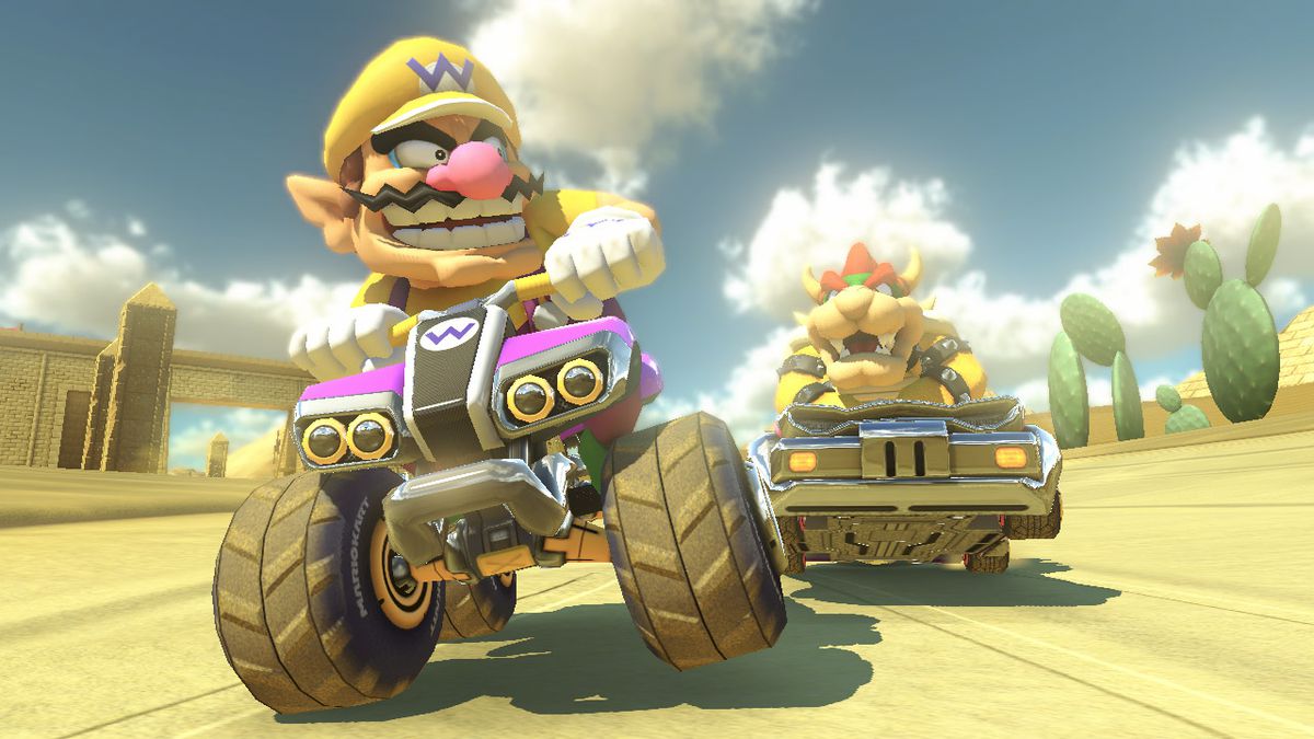 Wario e Bowser vanno in giro in Mario Kart