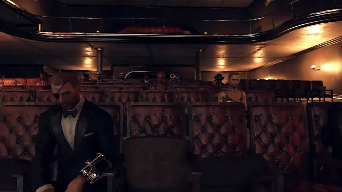 Fallout 76 - un uomo siede in un cinema, indossando uno smoking elegante.