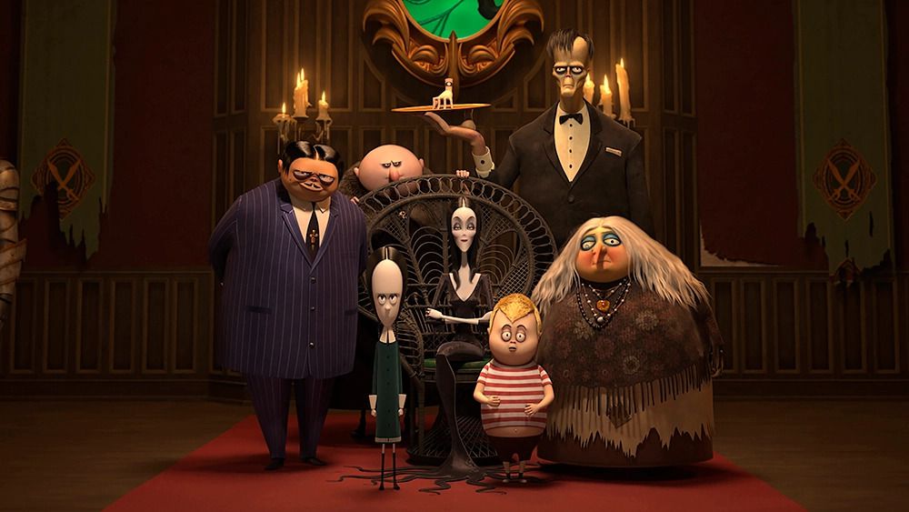 Gomez, Fester, Wednesday, Morticia, Pugsley, Lurch, and Grandmama Addams in The Addams Family 2