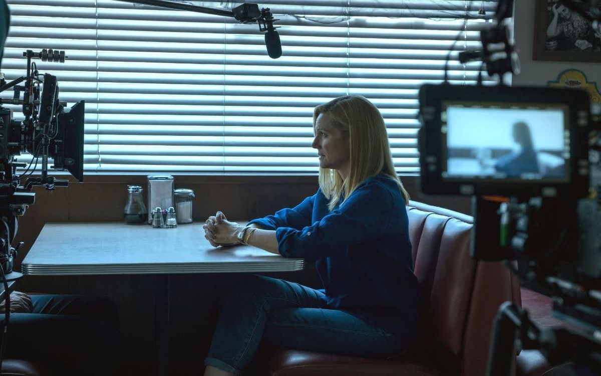 Laura Linney on the set of Ozark with cameras around her diner booth