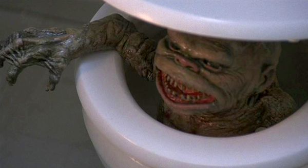 A ghoulie pops out of the toilet