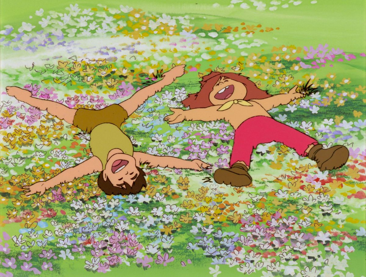 Conan e Jimsy si sdraiano in un campo di fiori, ridendo, in Future Boy Conan