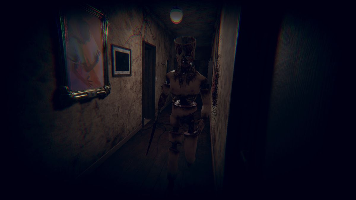 Mirror Layers: un mostro umanoide con una testa oblunga si avvicina al giocatore in modo intimidatorio