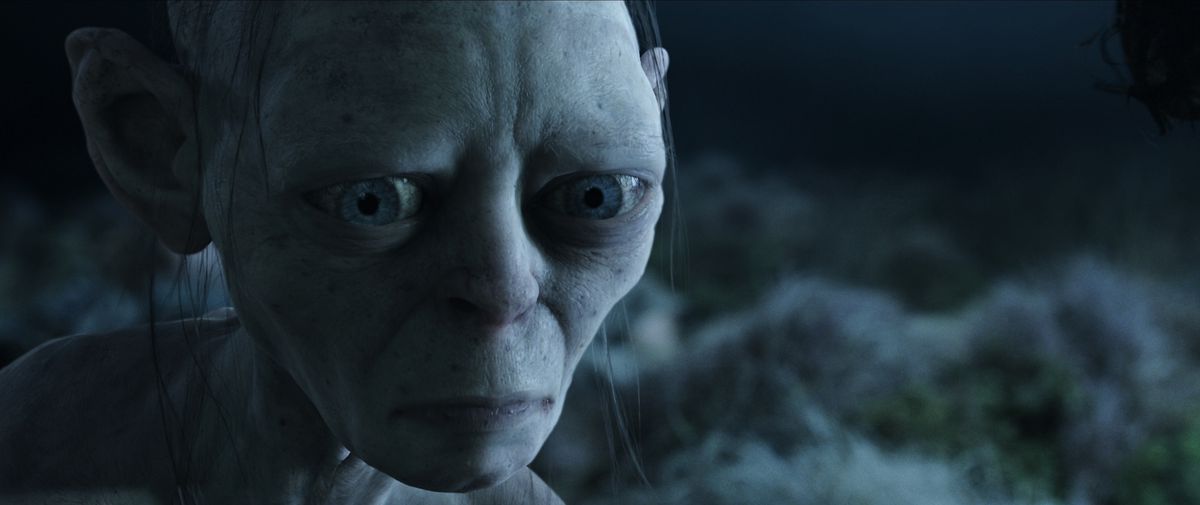 A close-up of a pensive Gollum in Lord of the Rings: The Two Towers