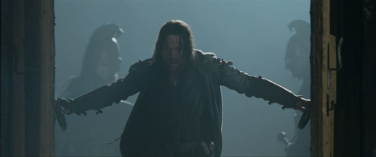 Aragorn bursts through the doors in Lord of the Rings: The Two Towers