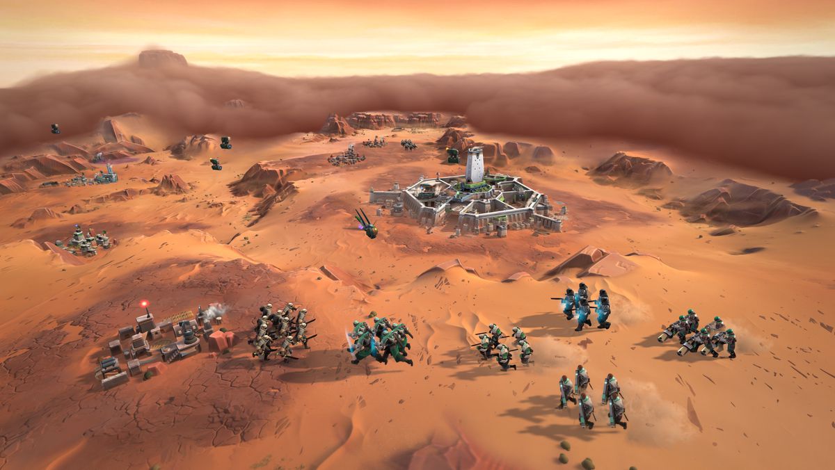 Armies cross a desert terrain in Dune: Spice Wars