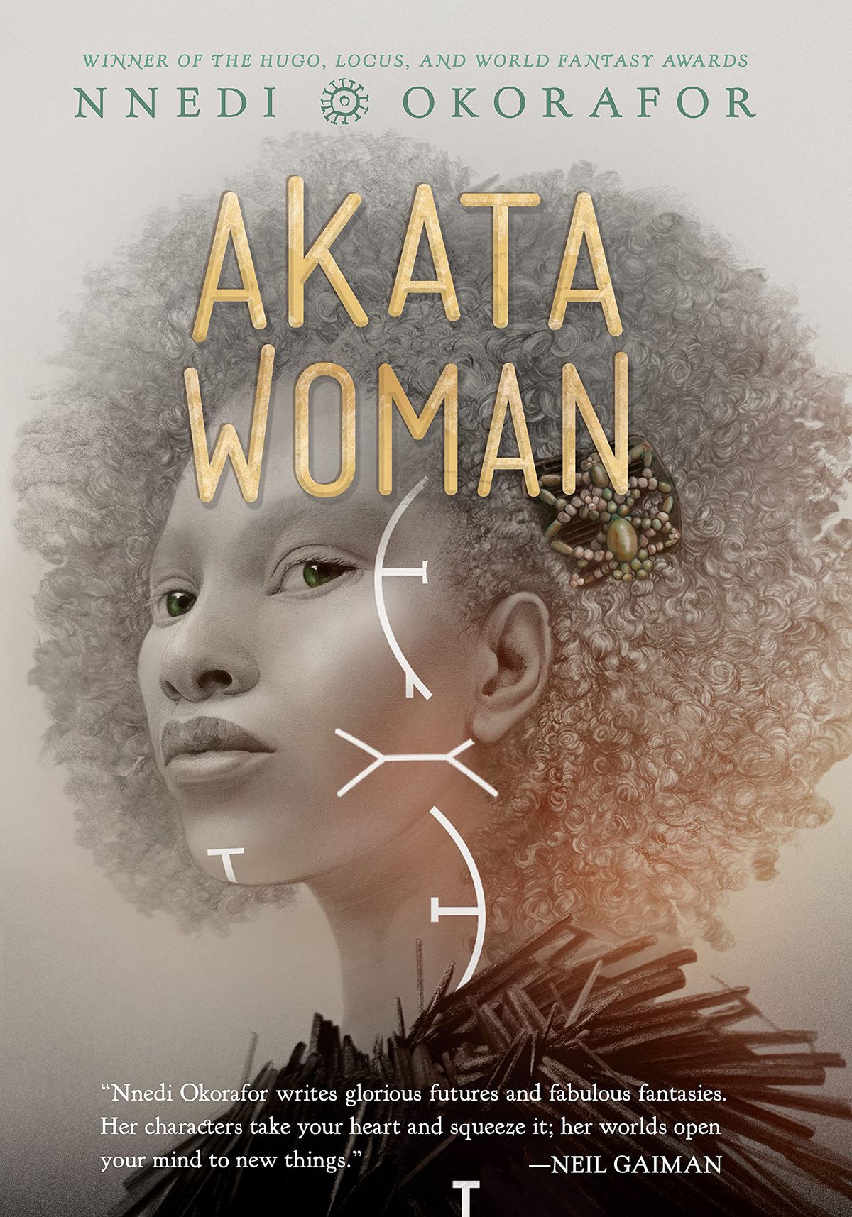 The cover for Akata Woman showing the semi-profile of a woman with an afro, illustrated in grayscale