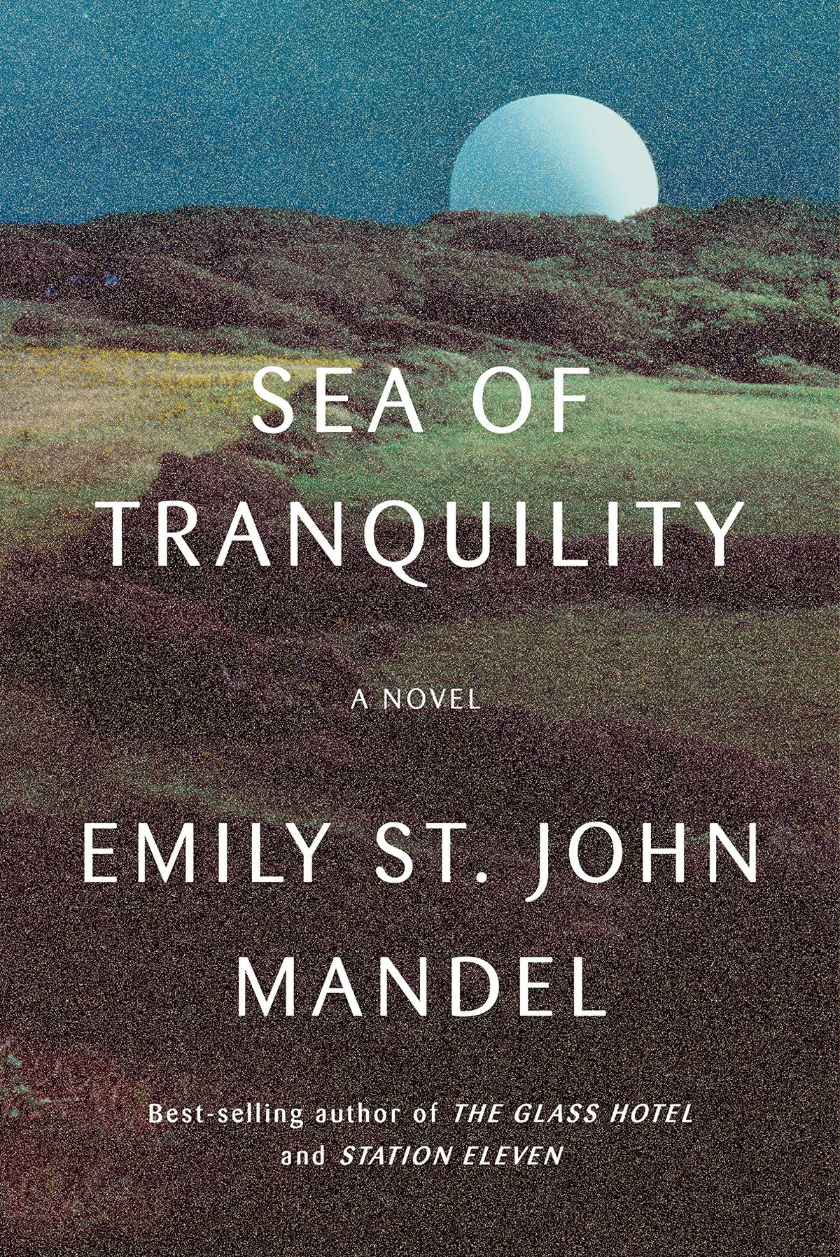 The cover for Sea of Tranquility showing a moon behind the horizon