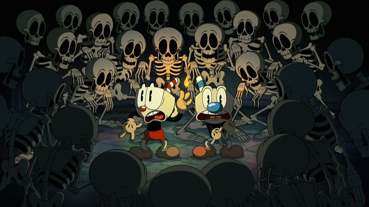 Cuphead e Mugman circondati da scheletri