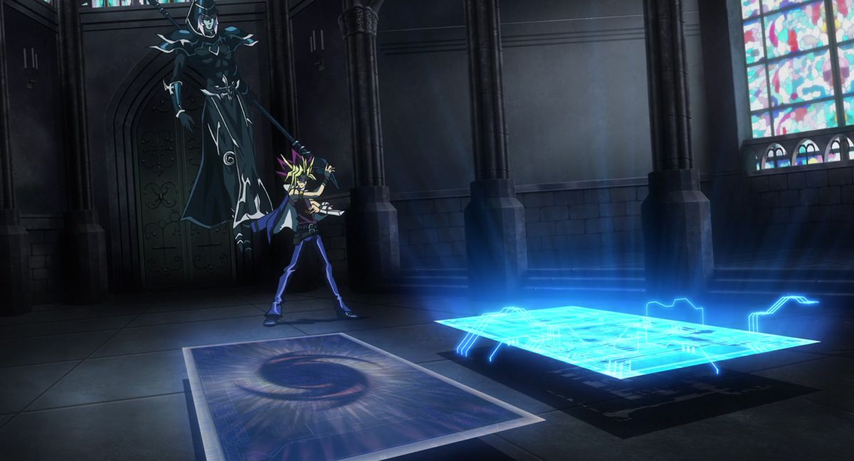Yugi evoca una carta davanti a sé mentre un personaggio della carta si libra dietro di lui in Yu-Gi-Oh: The Dark Side of Dimensions