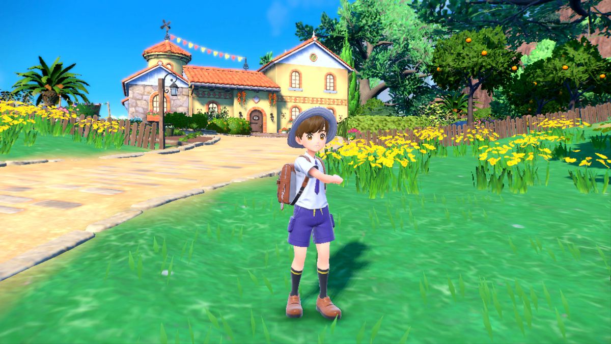 un allenatore pokemon in piedi davanti a una casa
