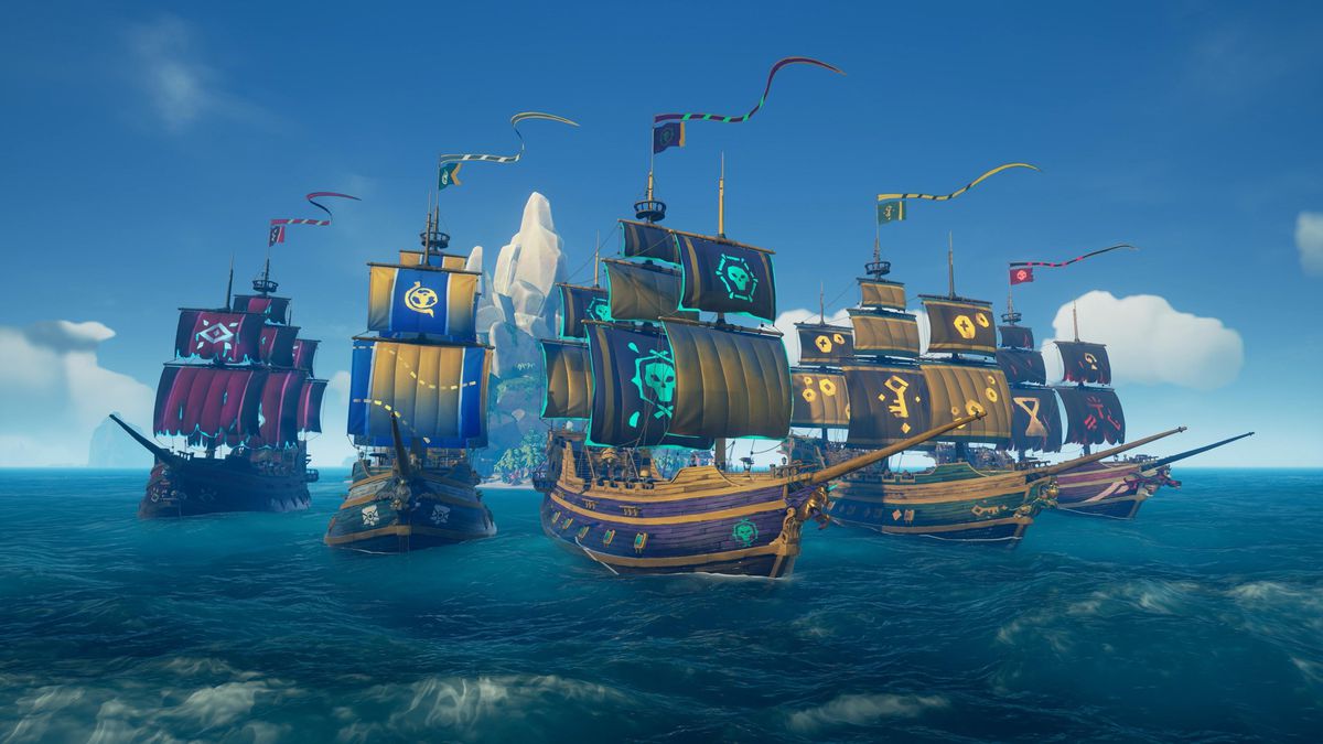 Sea of ​​Thieves - una flotta di galeoni all'esterno di un avamposto, ciascuno decorato con i cosmetici di una fazione diversa.
