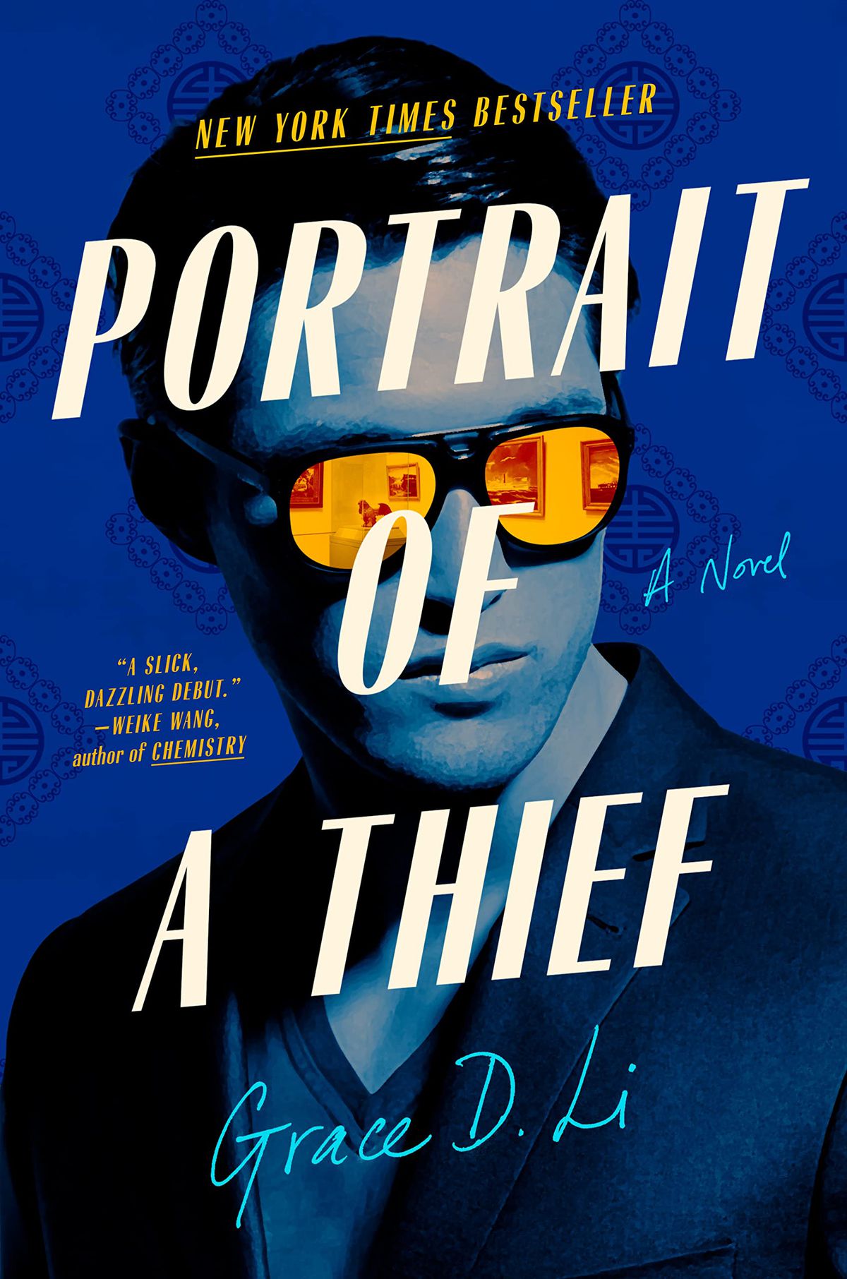 La copertina di Portrait of a Thief, che mostra il ritratto di un asiatico, con un lavaggio blu e occhiali da sole riflettenti arancione brillante.