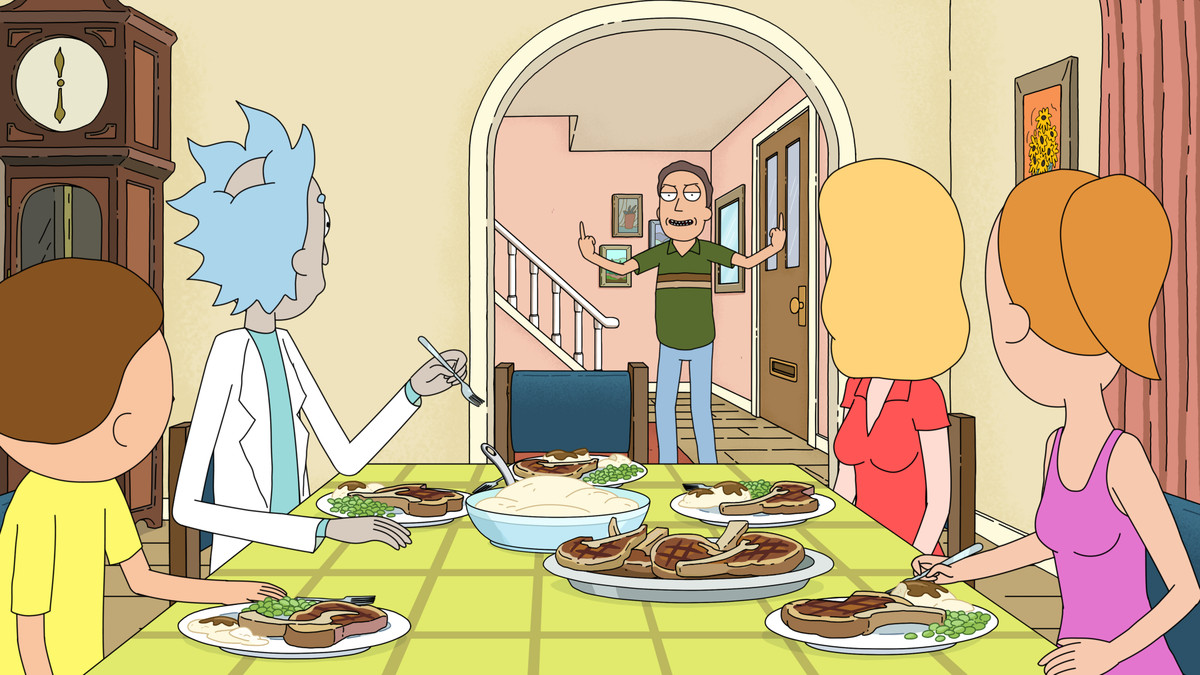 Jerry nell'atrio che lancia la sua famiglia, che è seduta a tavola a mangiare e lo guarda in primo piano