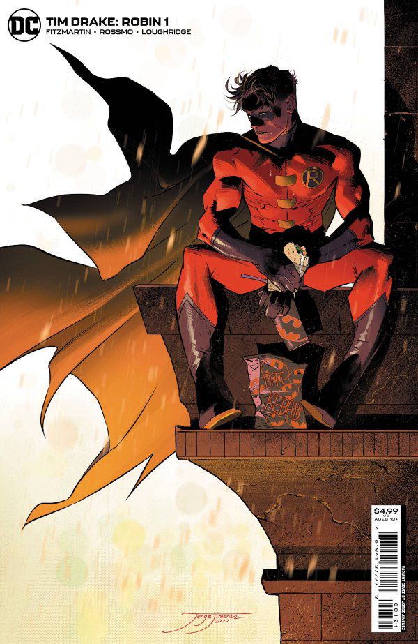Robin seduto in cima a un edificio, il suo mantello svolazzante al vento