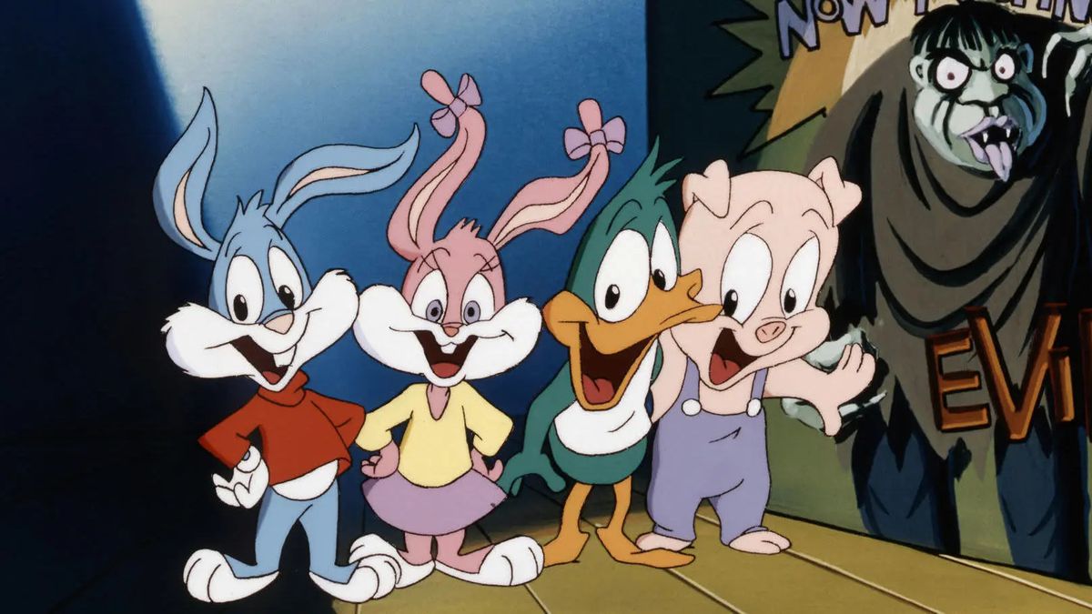 Buster Bunny, Babs Bunny, Plucky Duck e Hamon J. Pig sorridono allegramente in Night Ghoulery di Tiny Toons.