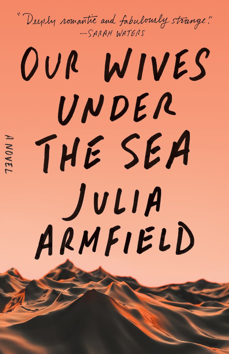 Immagine di copertina di Le nostre mogli sotto i mari, con uno sfondo rosa su quella che sembra una catena montuosa fatta di materiale morbido.