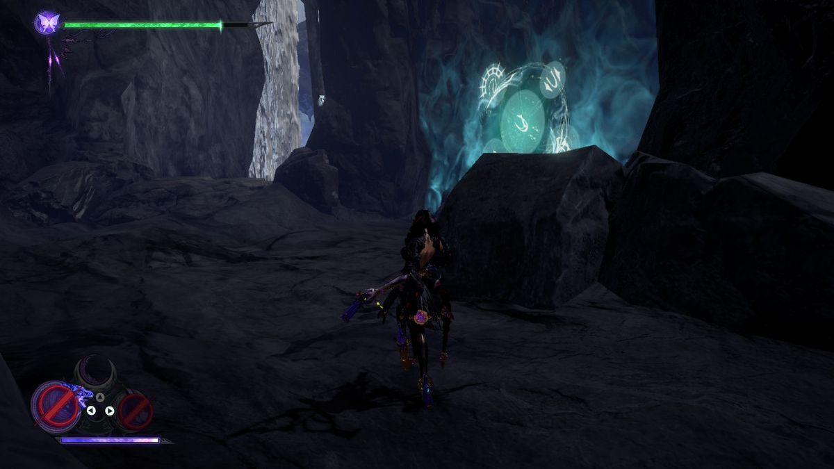 Bayonetta si trova in una grotta buia accanto a una perla della luna spezzata in Bayonetta 3.