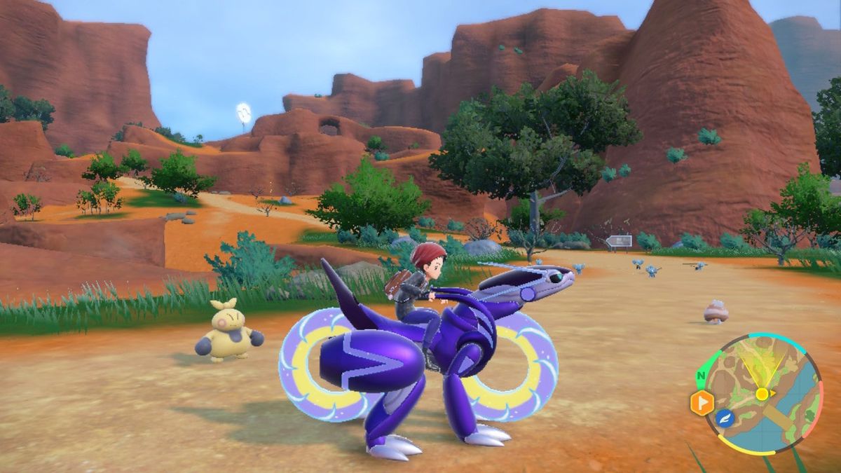 L'allenatore di Pokémon cavalca un Miraidon nel mondo aperto di Pokémon Scarlet e Violet