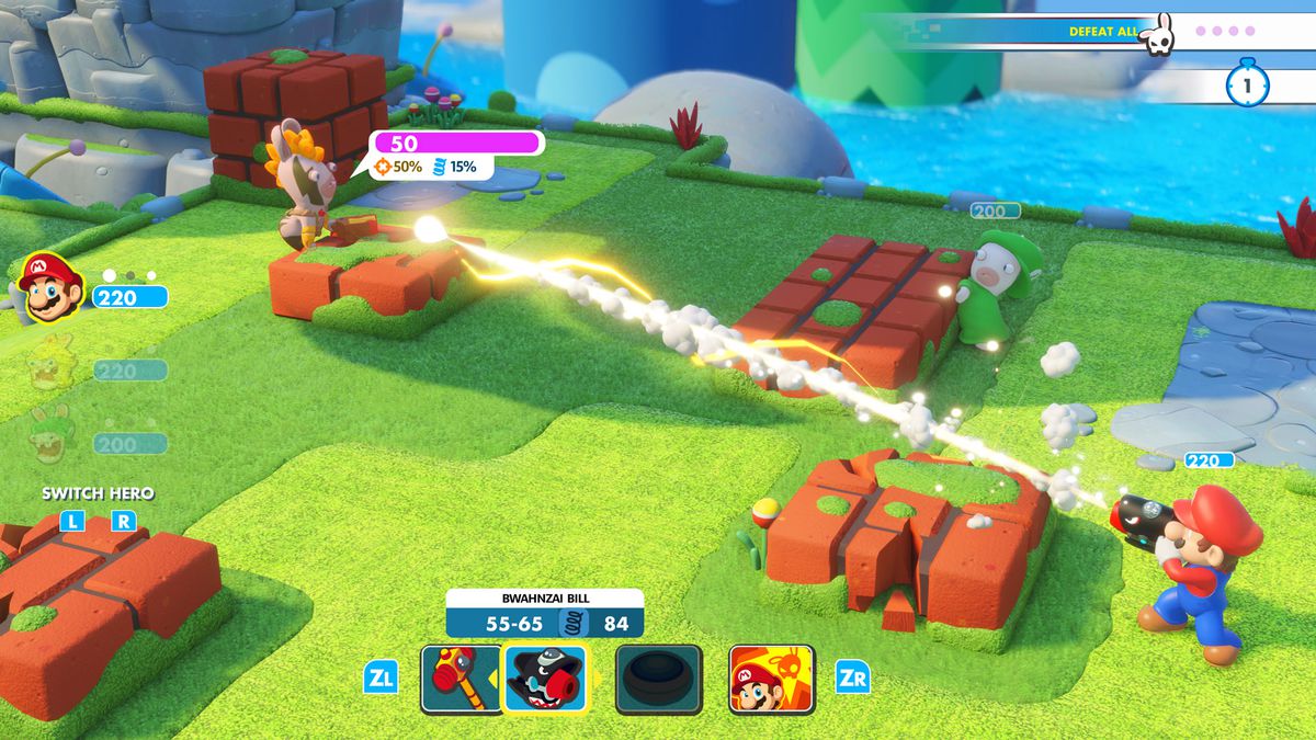 In questo screenshot di Mario + Rabbids Kingdom Battle, Mario punta un cannone a braccio e spara a un coniglio vicino con la pittura per il viso.  Sia Mario che il Rabbid sono in piedi accanto a blocchi alti fino alla cintola che usano come copertura.  Un obiettivo in salita