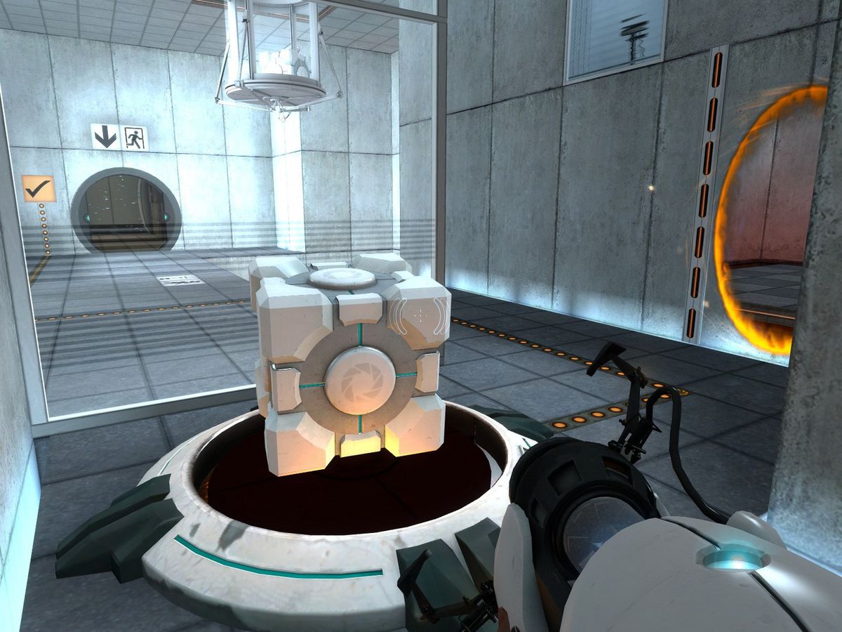 Uno screenshot di Portal, con un cubo al centro dello schermo.
