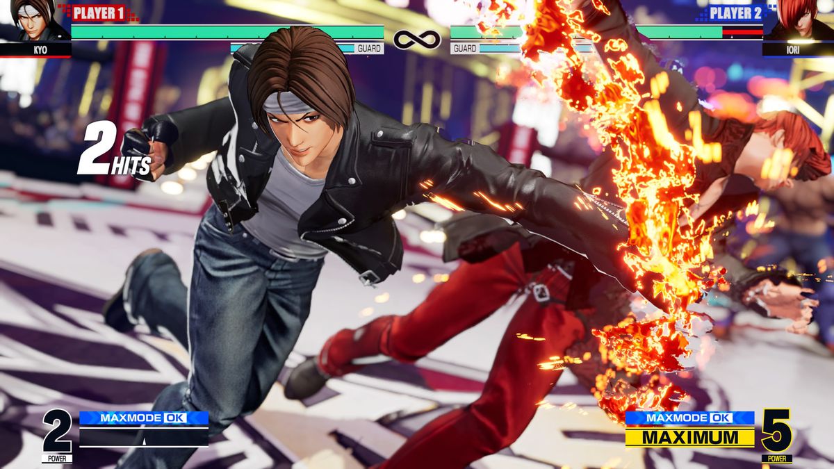 Kyo Kusanagi di King of Fighters 15 sferra un epico pugno in faccia in una partita contro Iori Yagami