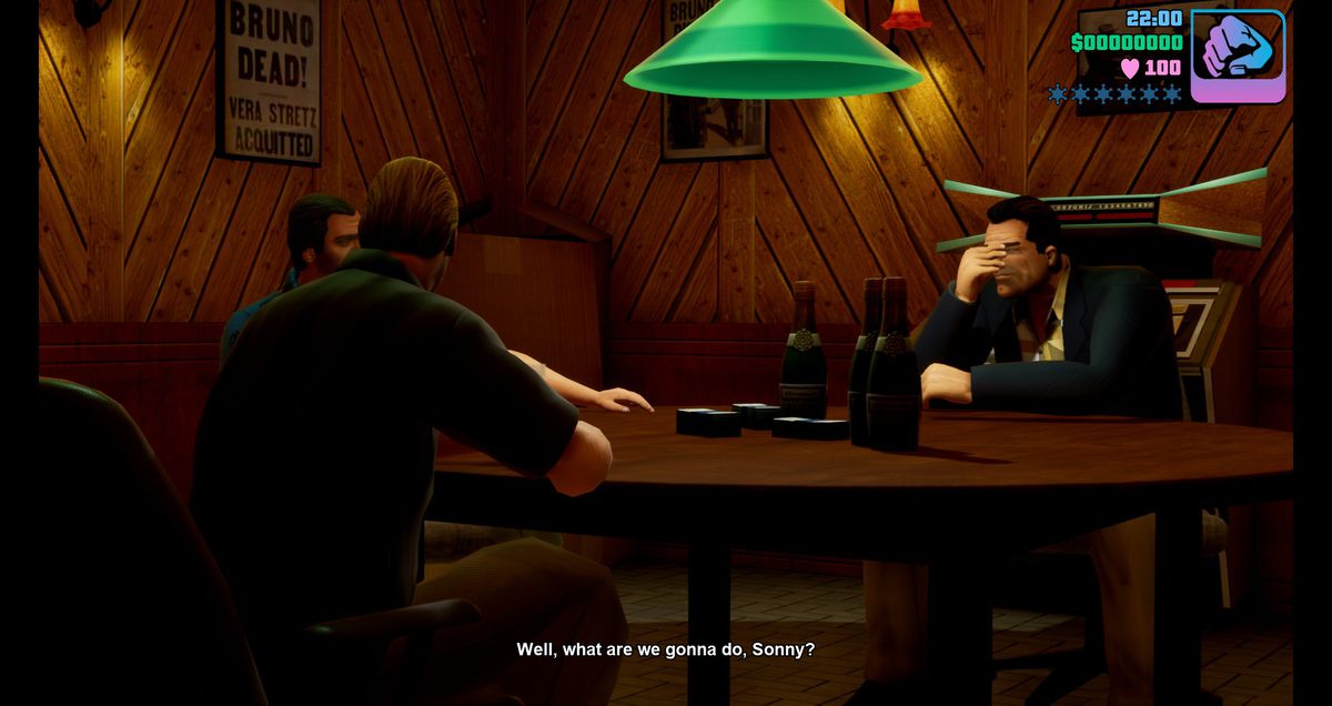 I membri di un sindacato criminale si siedono attorno a un tavolo in una stanza scarsamente illuminata nella trilogia di GTA.