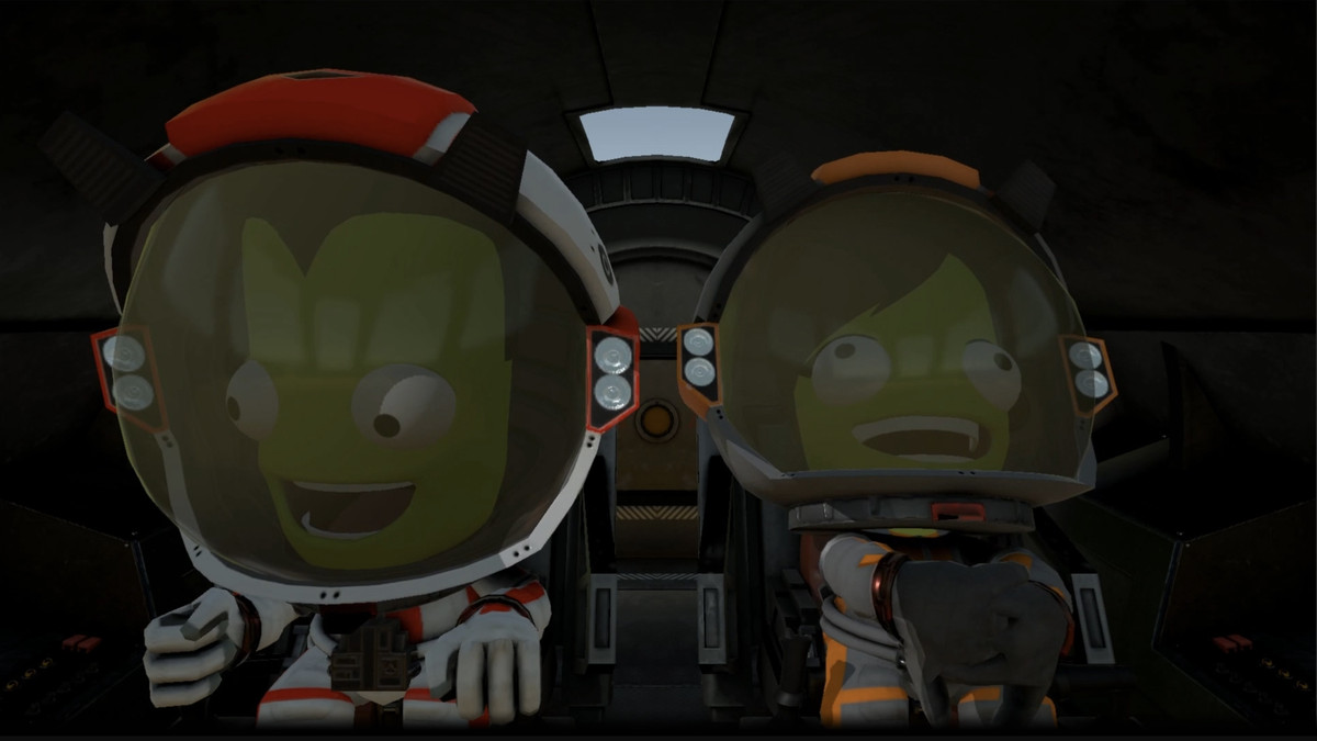 Due Kerbal, alieni verdi di Kerbal Space Program 2, seduti in un'astronave.  Entrambi hanno espressioni entusiaste, leggermente sconvolte.