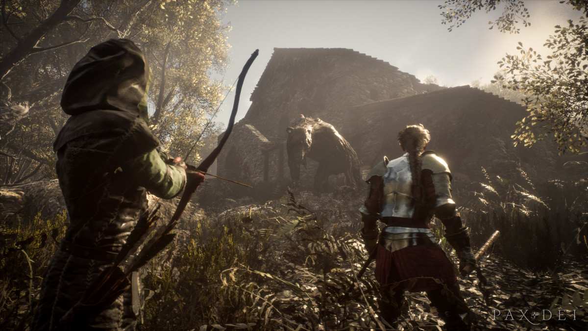 I giocatori si schierano contro una mostruosità simile a un orso che si è rintanata in una rovina di pietra.