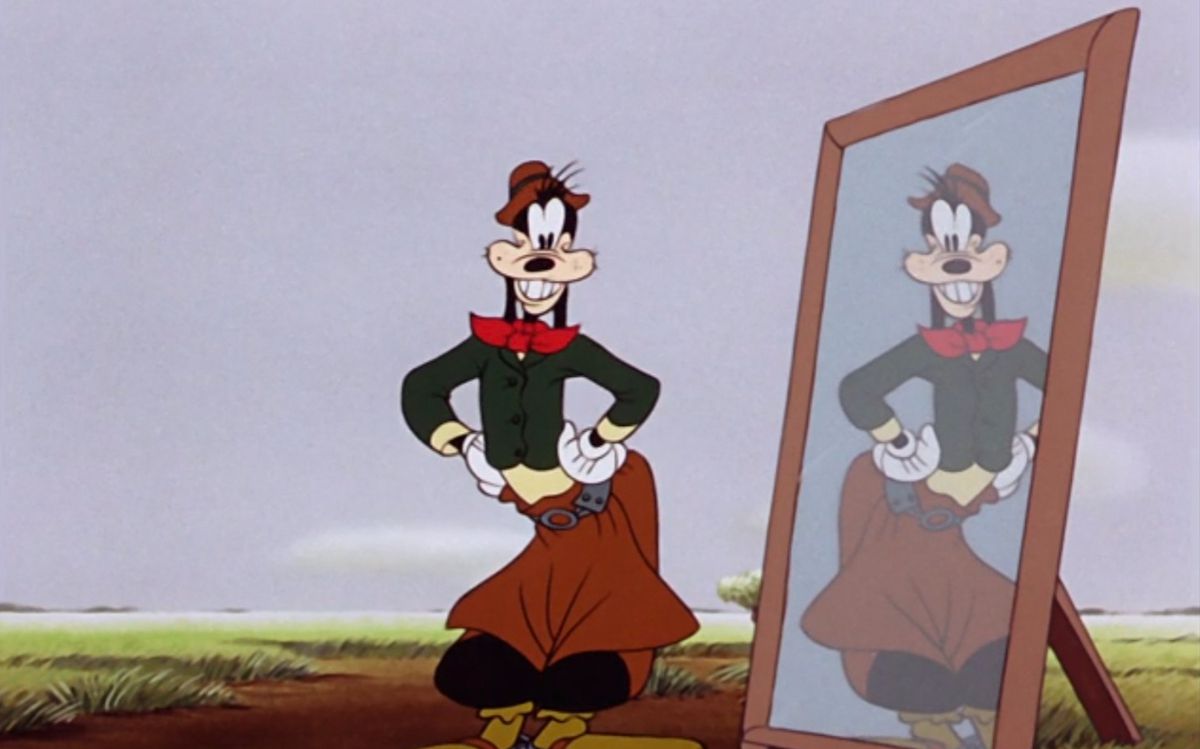 Pose goofy, hipshot e sorrisetto, davanti a uno specchio mentre indossa abiti tradizionali gaucho nel cortometraggio della Disney 