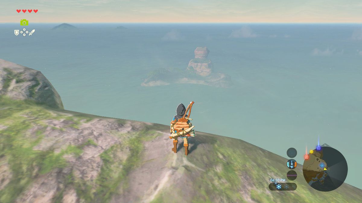 Link è su una scogliera che guarda la lontana isola di Eventide in The Legend of Zelda: Breath of the Wild.
