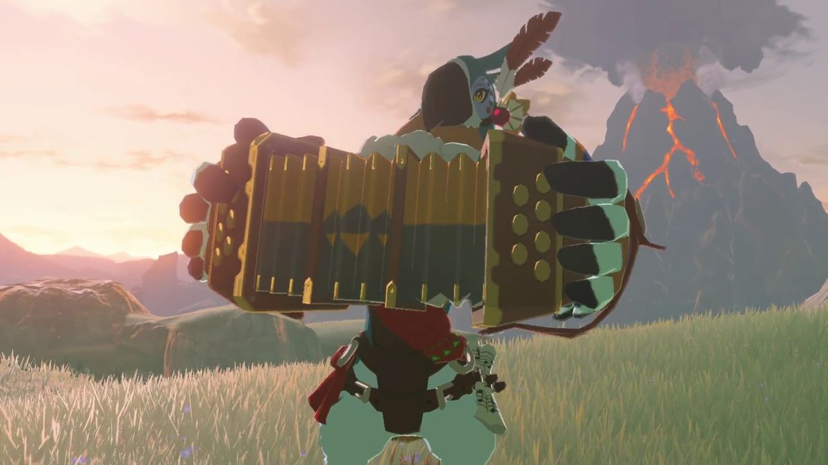 Kass, un uccello antropomorfo, suona la fisarmonica con Death Mountain sullo sfondo in The Legend of Zelda: Breath of the Wild.
