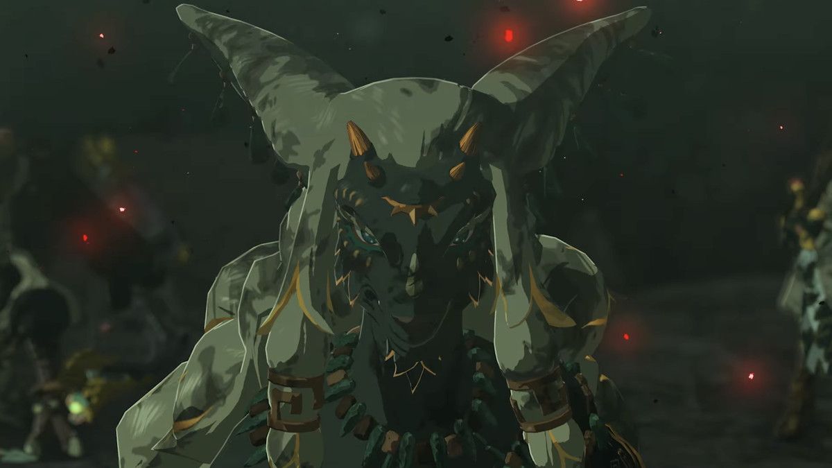 Un'immagine di un nuovo personaggio di The Legend of Zelda: Tears of the Kingdom.  Ha una faccia da capra e pelo dappertutto.  Ha accenti dorati che decorano anche il suo viso. 